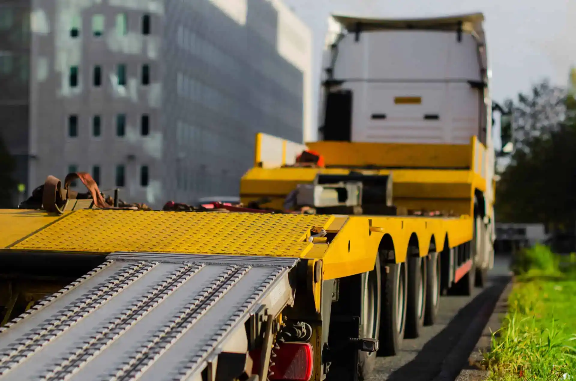Transport trailer for heavy machinery and equipment. Heavy-duty transport trailer for machinery shipping and logistics.